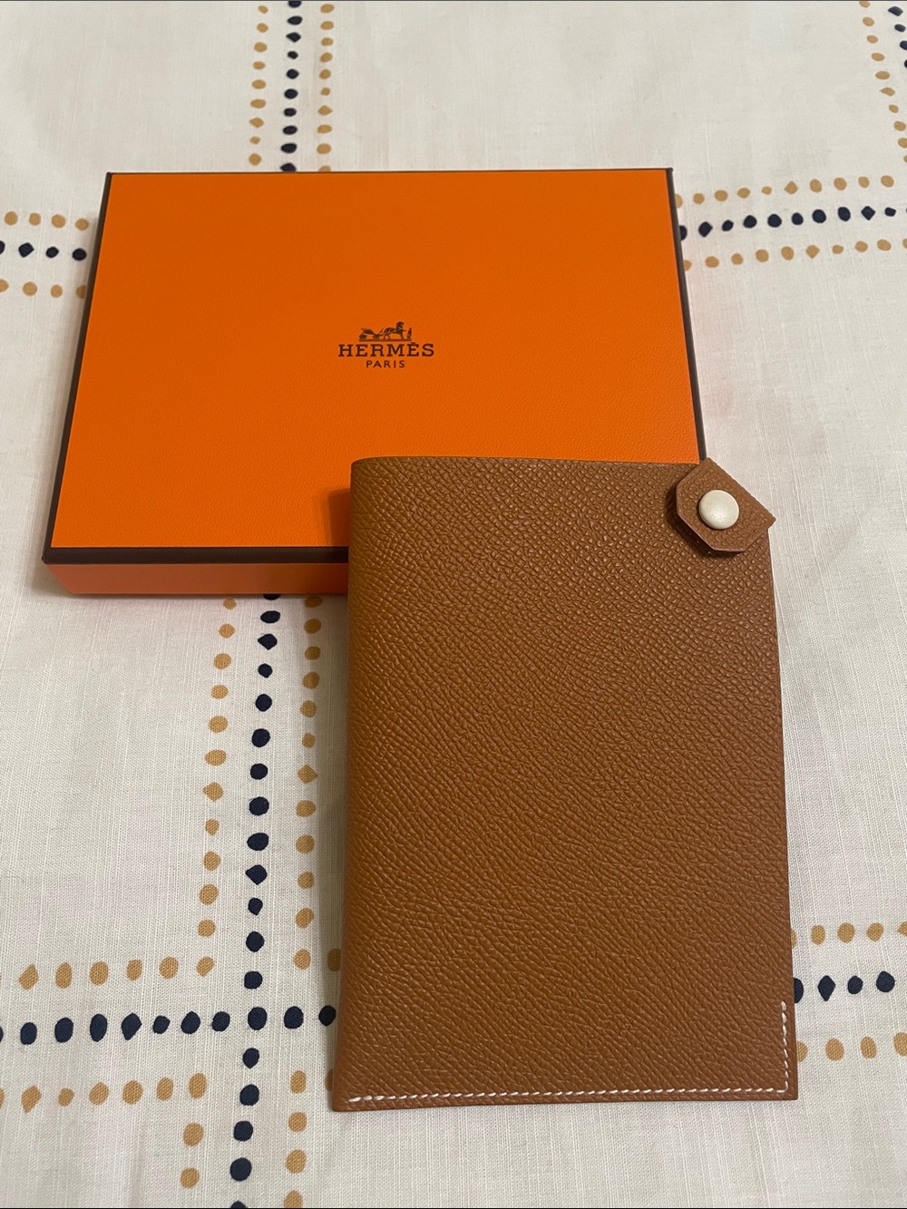 Hermes Tarmac Epsom Leather Passport Holder in gold color & Nata button